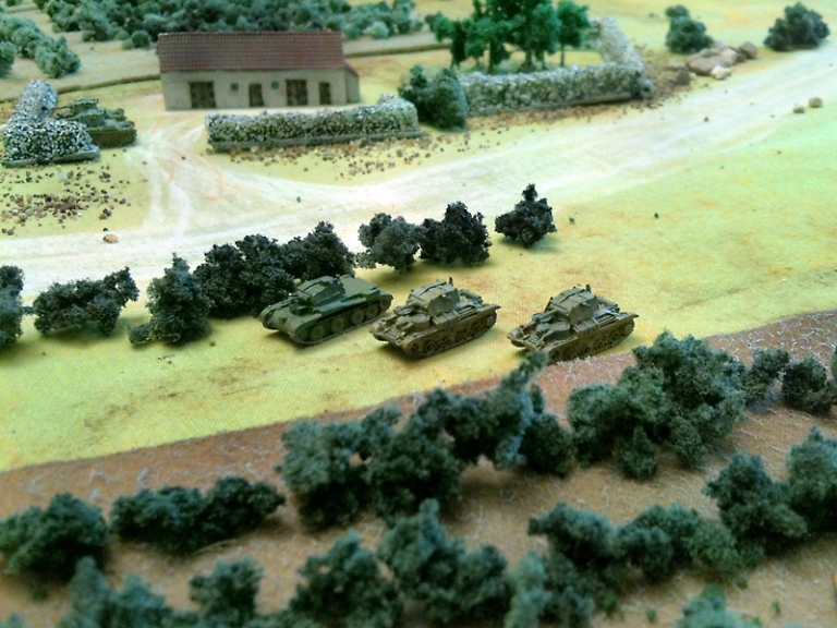 Meanwhile an A13 and 2 A9s fire HE at the MG34s positions. The Germans had heavy casualties of that. 